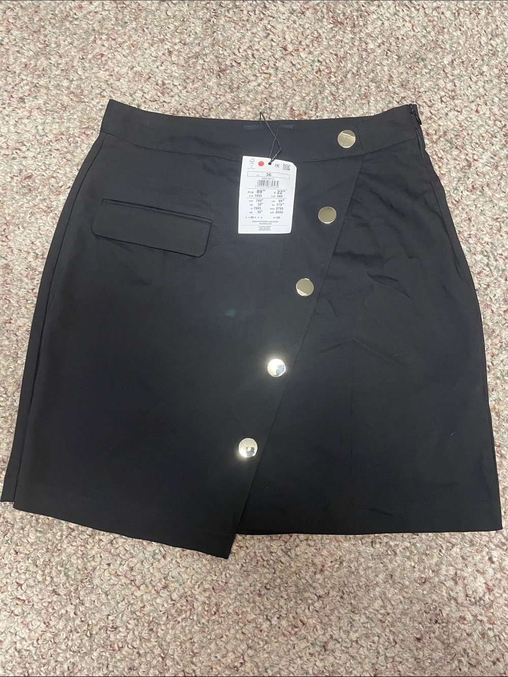 Mohito gold button asymmetrical hem mini skirt